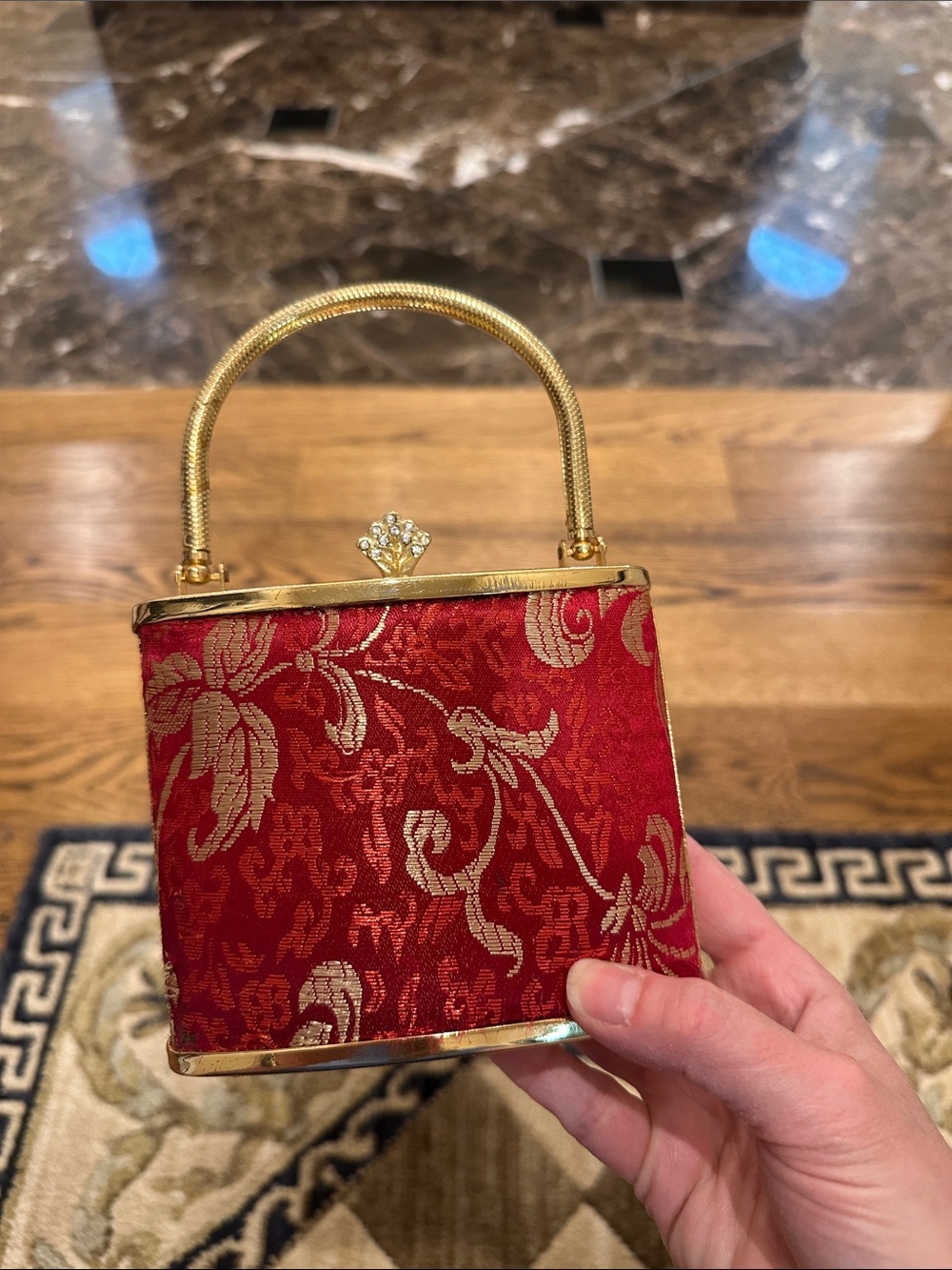 Gold metal and red brocade hand bag